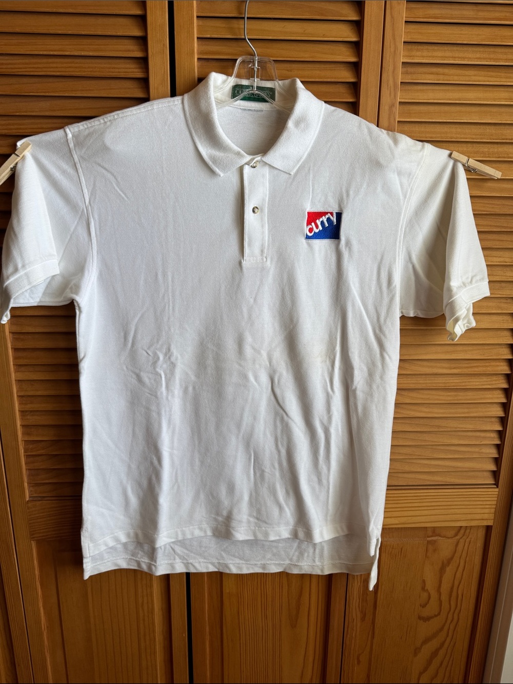 White Polo Shirt with Red & Blue CURRY logo